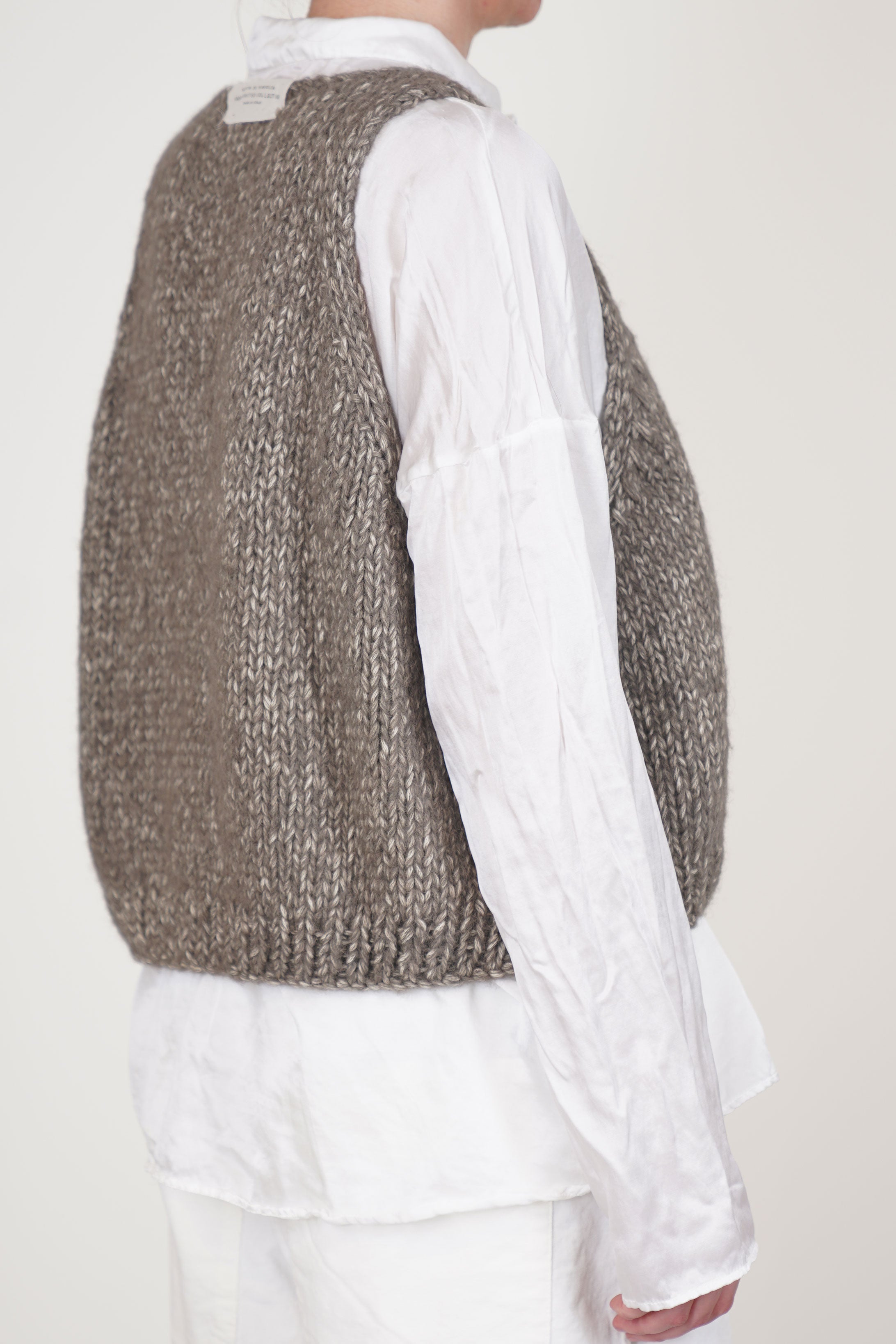 hand knitted vest co|wp pepper