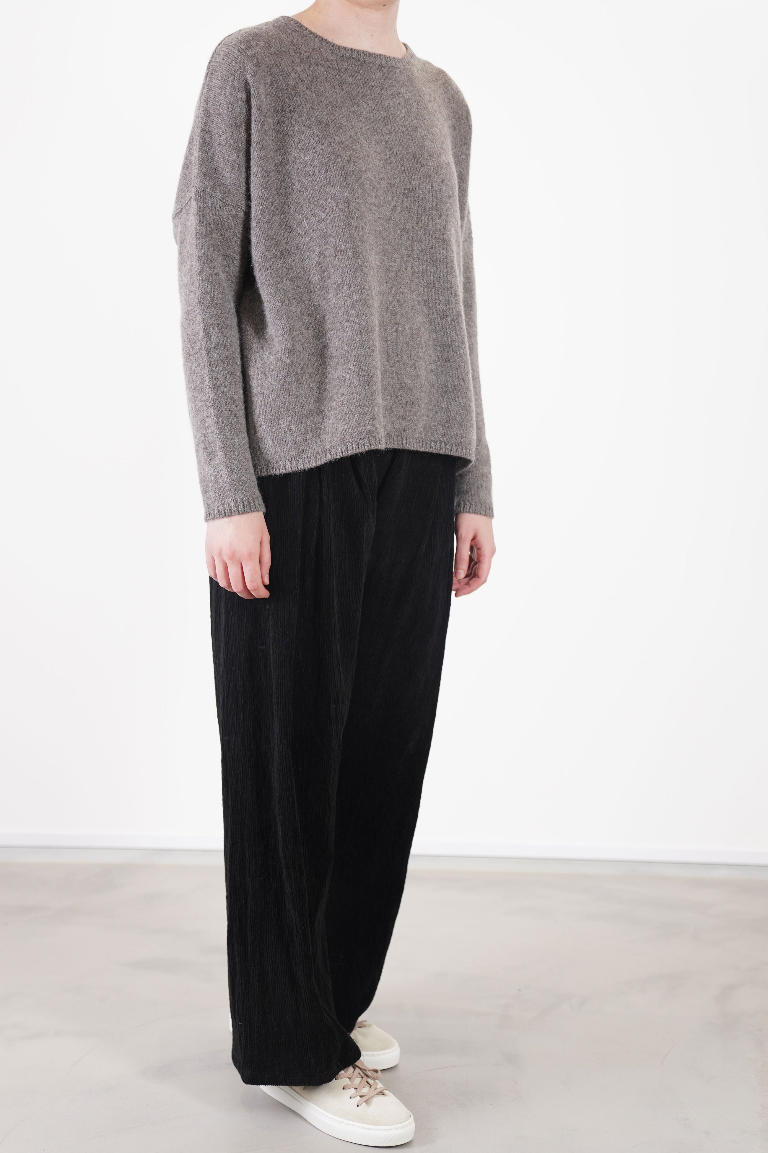 apuntob (a.b) knitwear cashmere alpaca walnut worn with apuntob trousers cord black for an effortless and styled silhouette