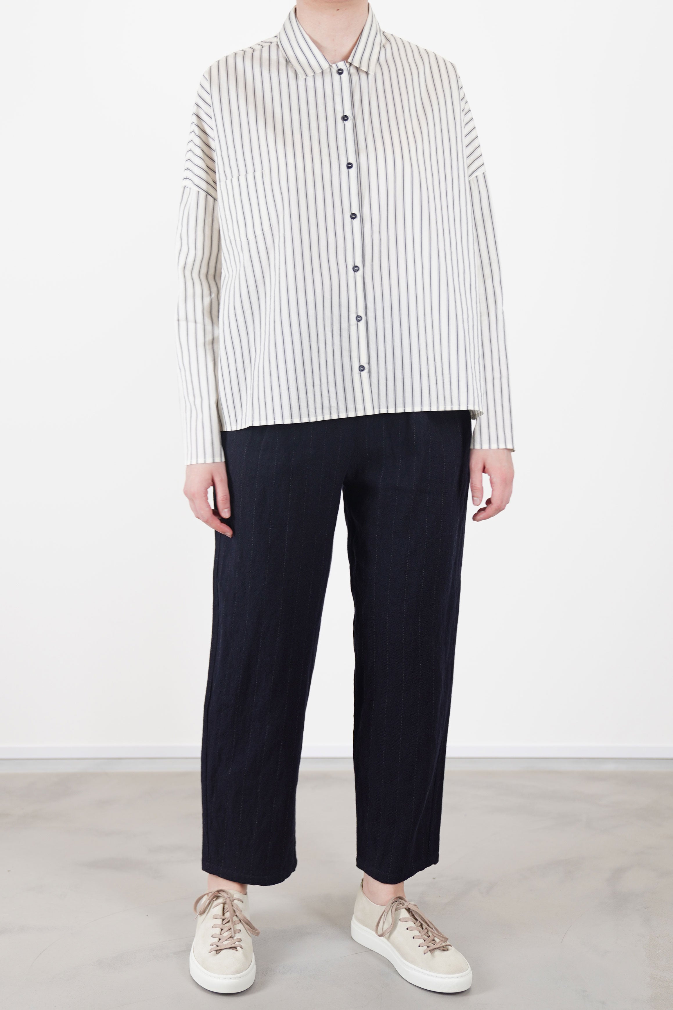 apuntob (a.b) shirt cotton silk stripe natural black worn with apuntob woolen trousers blue thin stripes
