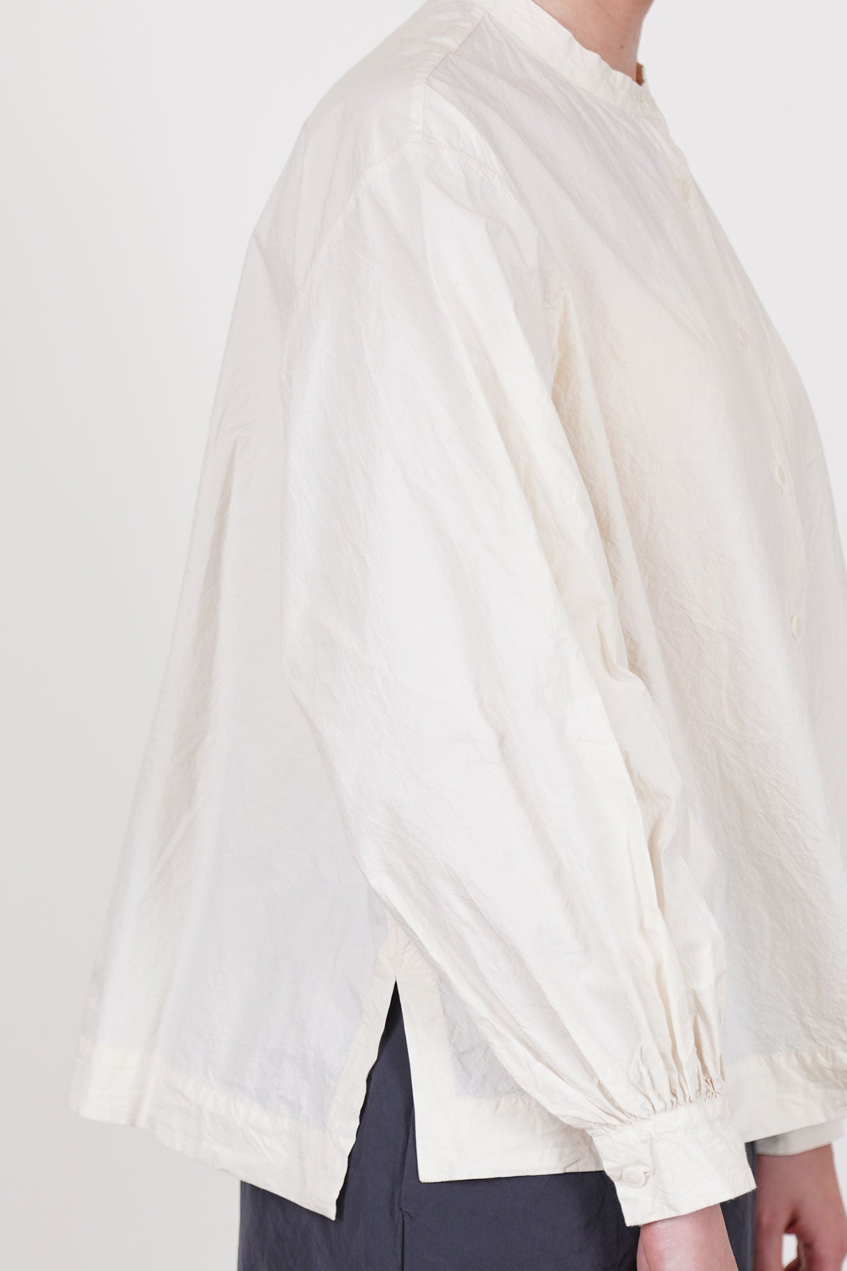 casey casey biggy grandad shirt natural hemline that is slightly longer at the back and side slit detail