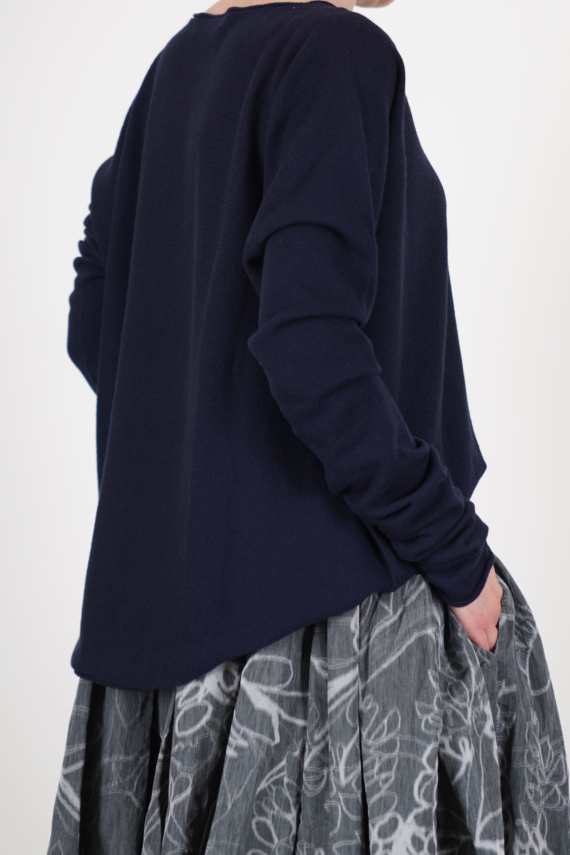 back view of casey casey seamless jumper cashmere night boat neckline and relaxed fit.