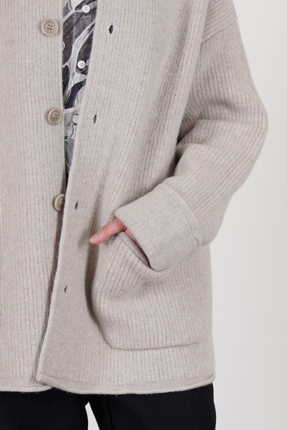 detail view of casey casey jacket rove light grey wool front pocket detail adn corozo front button opening