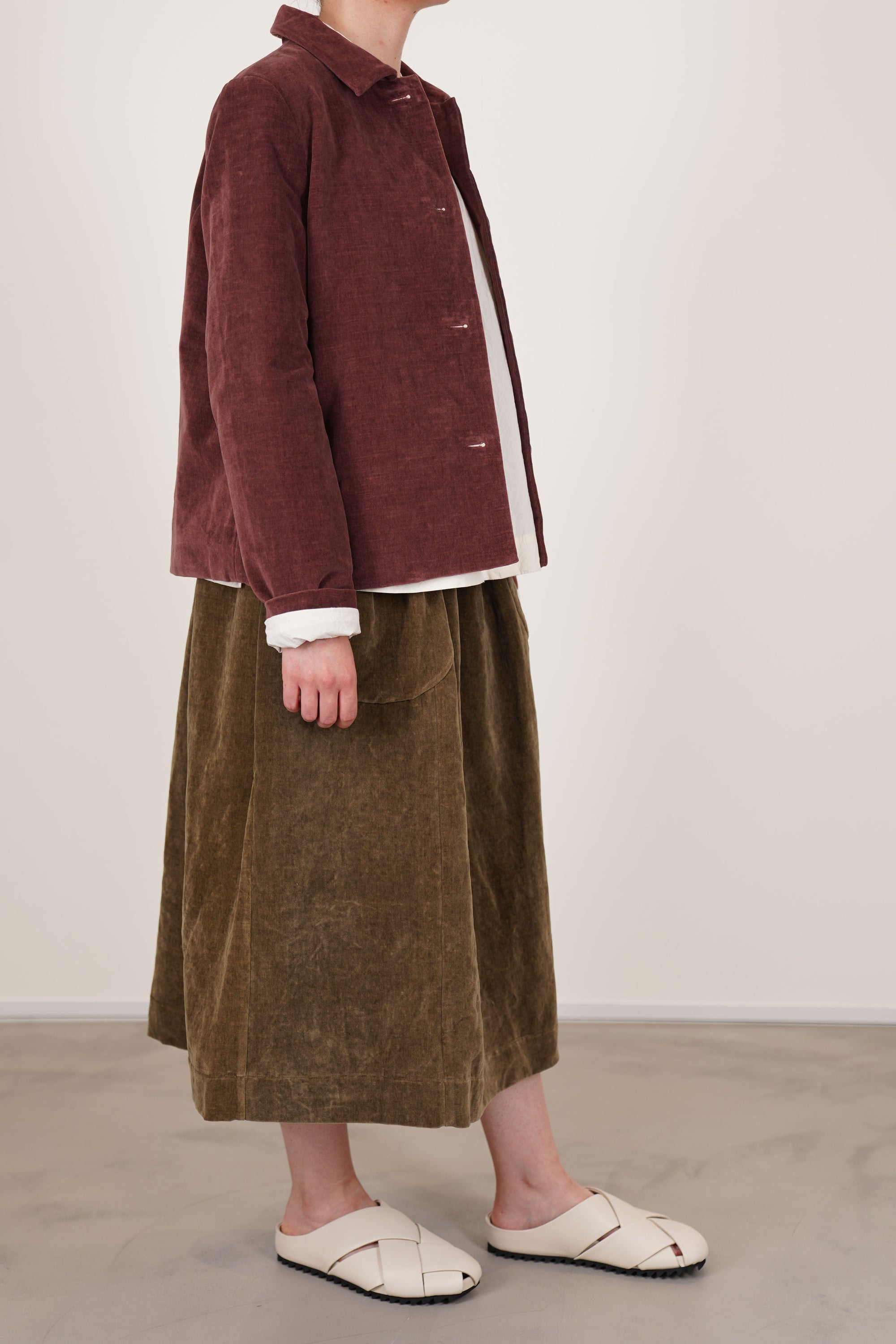 profile view of casey casey pwet jacket velvet prune soft, plush and dry to the touch cotton material