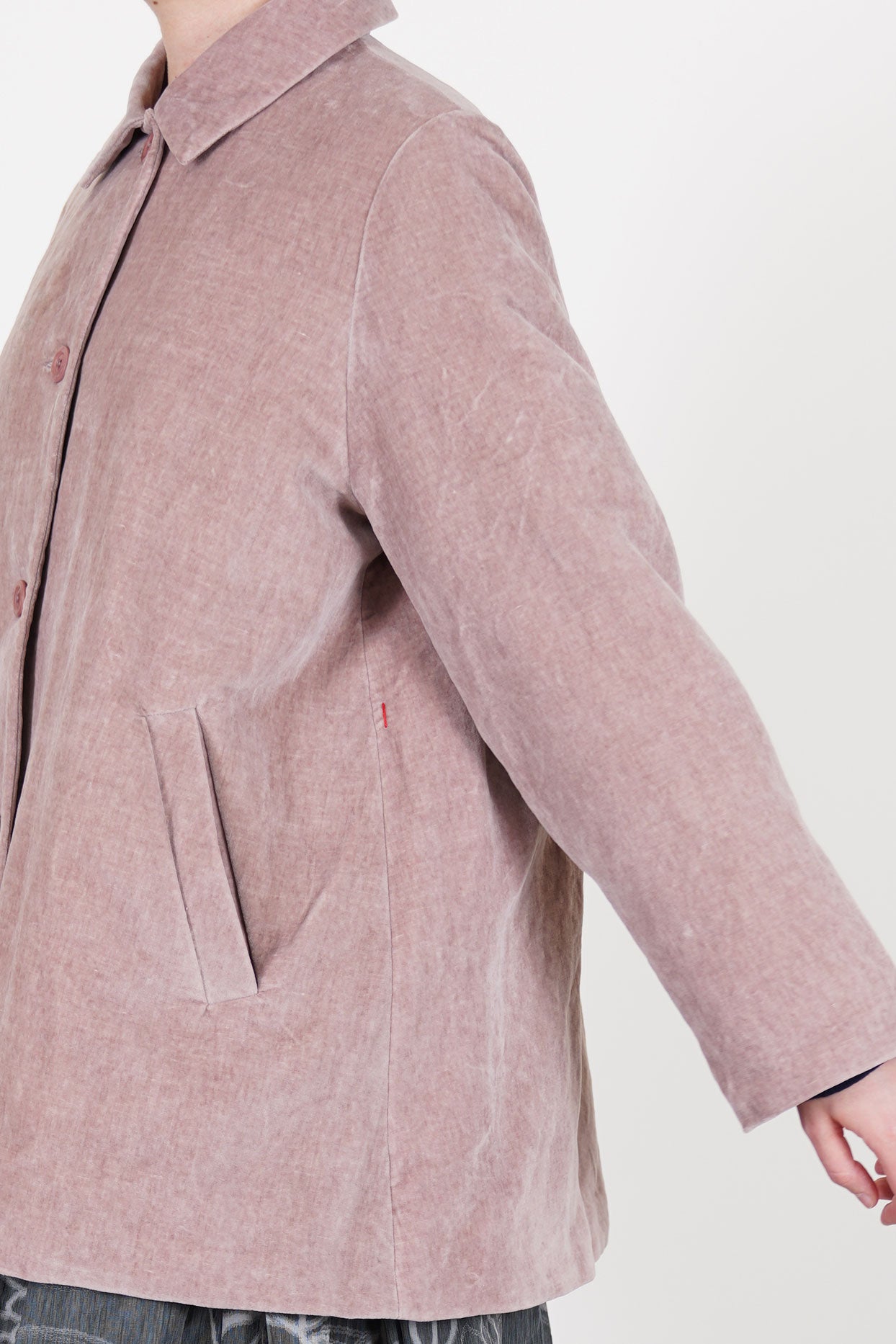 casey casey soleil jacket velvet dusty pink  detail view of long sleeves, side slash pockets and signature Casey Casey red string