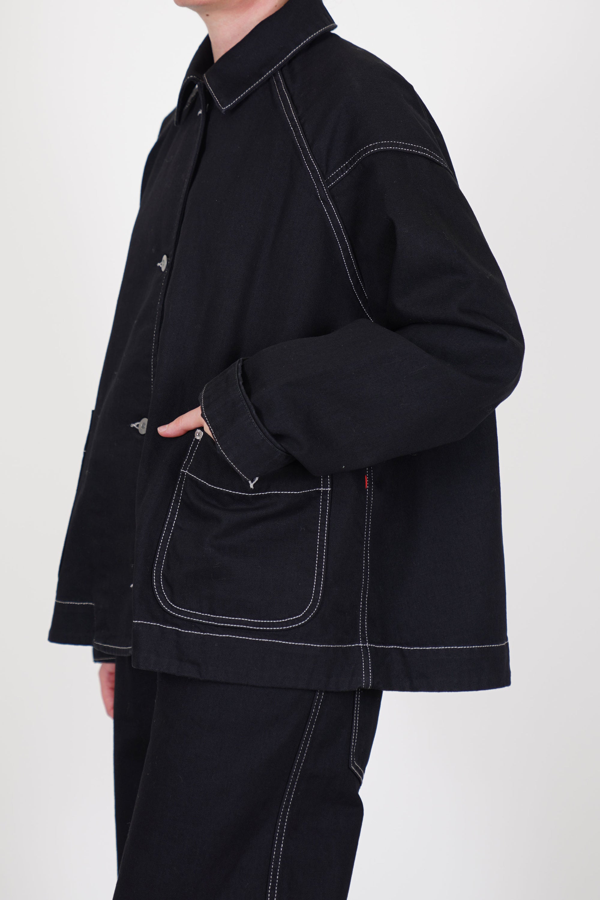 casey casey drays travail jacket denim black relaxed and loose cut with subtle contrast stitching details throughout. unlined.