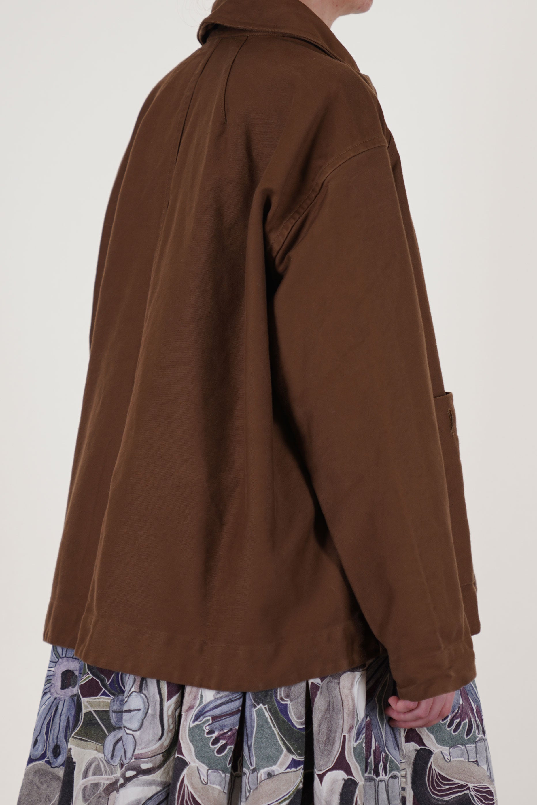 back view of casey casey drays travail jacket ginger finished with a washed treatment, this jacket will develop a rich patina over time, enhancing its character and timeless appeal