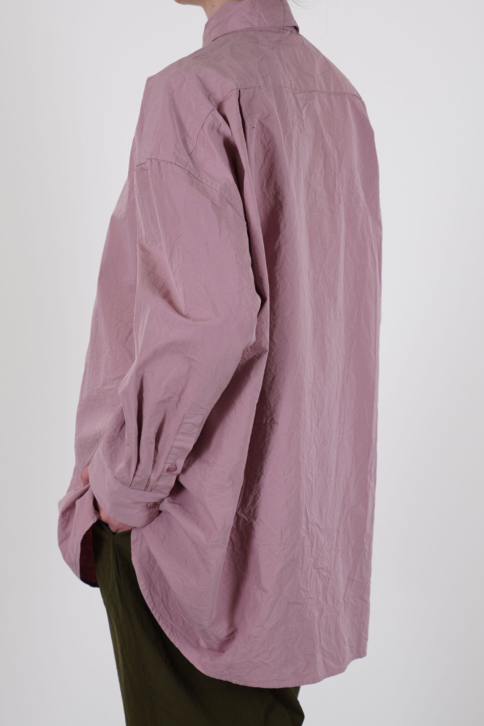 back view of casey casey hamnet shirt pink big back pleat detail and gathered details at the cuffs