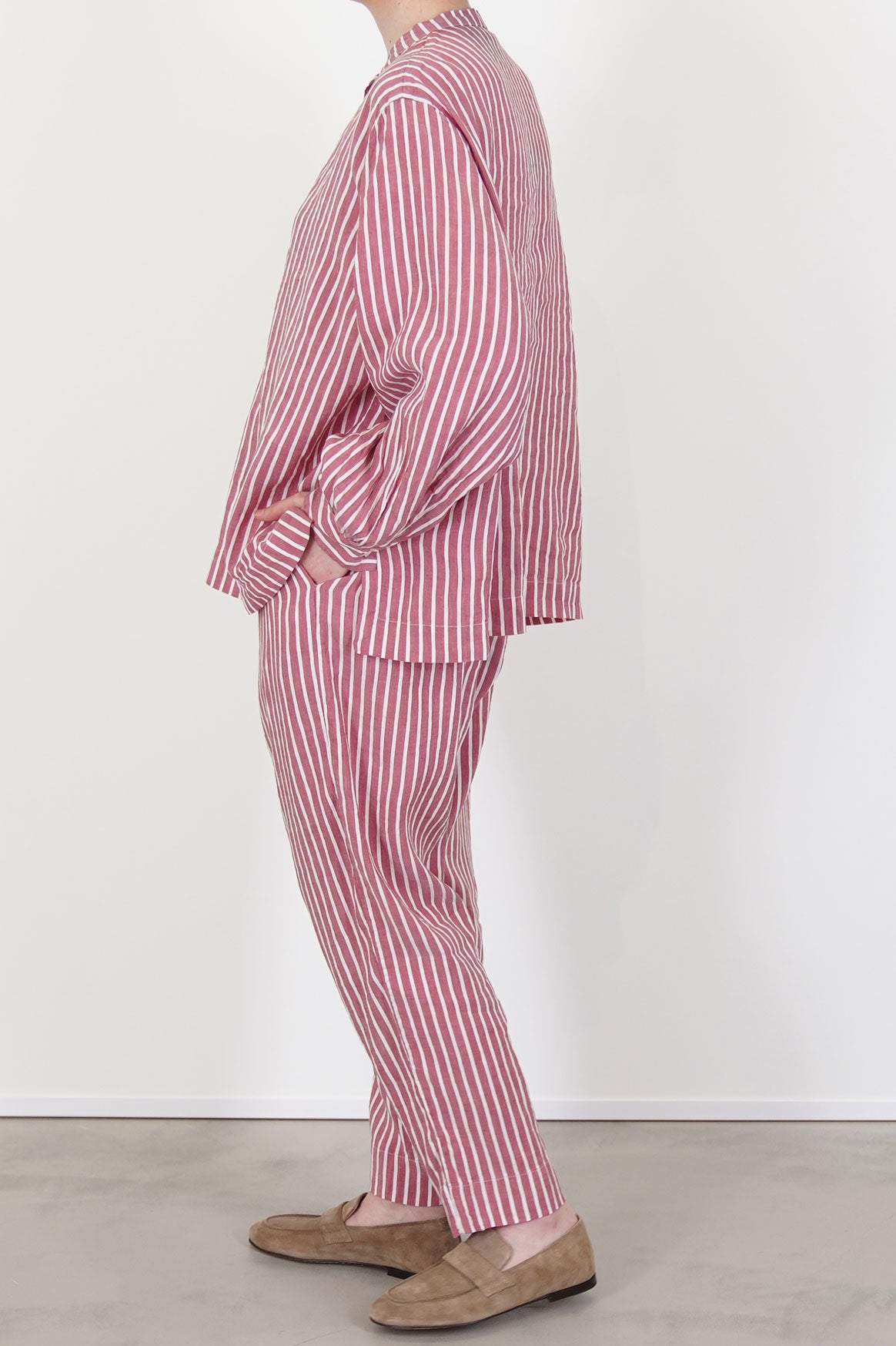 profile view of casey casey tied sarouel pant stripe tapered leg and refined silhouette