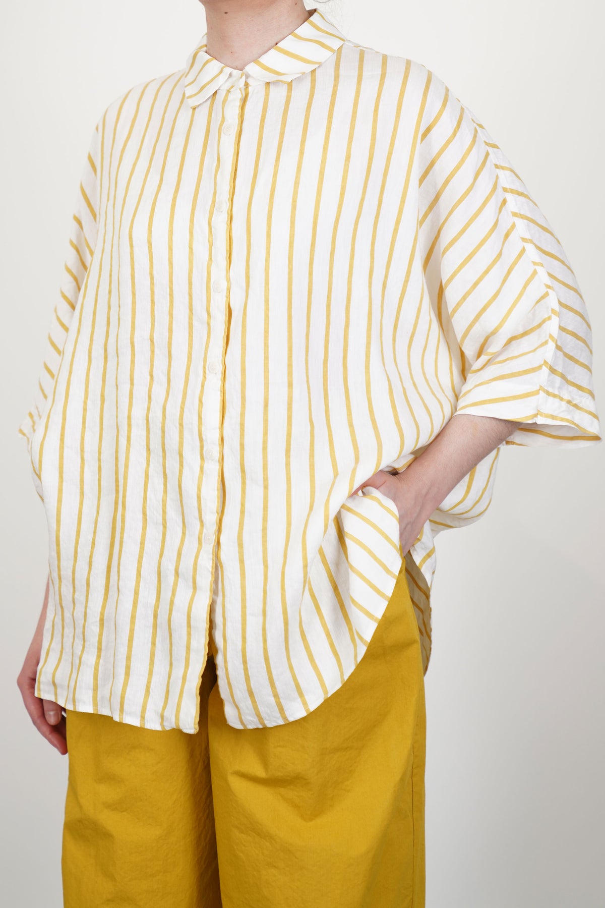 Side view of Casey Casey Waga SS Stripe Linen Shirt showing relaxed fit