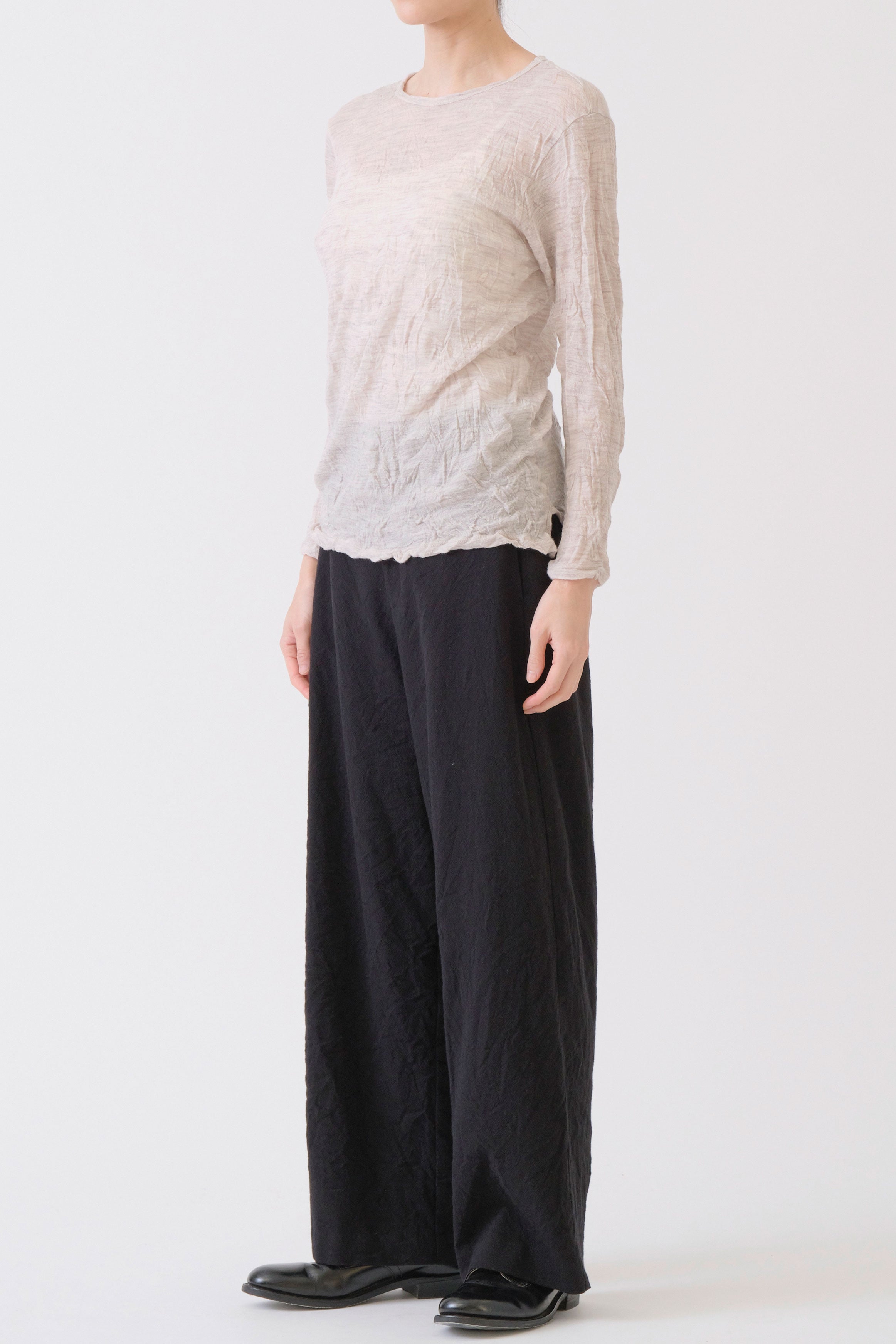 side view of pas de calais wool gauze crinkle pullover ivory long sleeves, soft and thin wool material in a soft drape