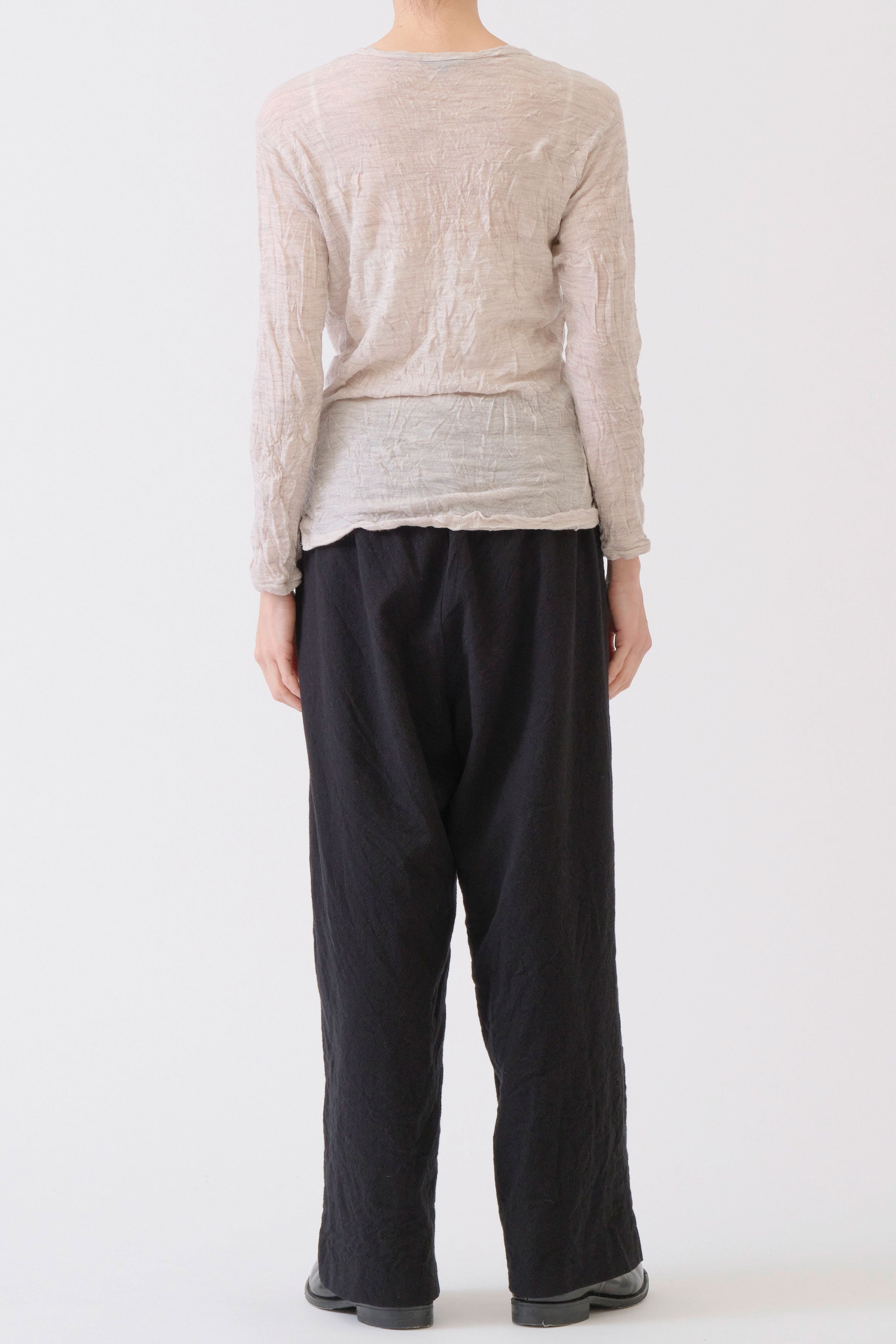 back view of pas de calais wool gauze crinkle pullover ivory soft drape and thin wool material