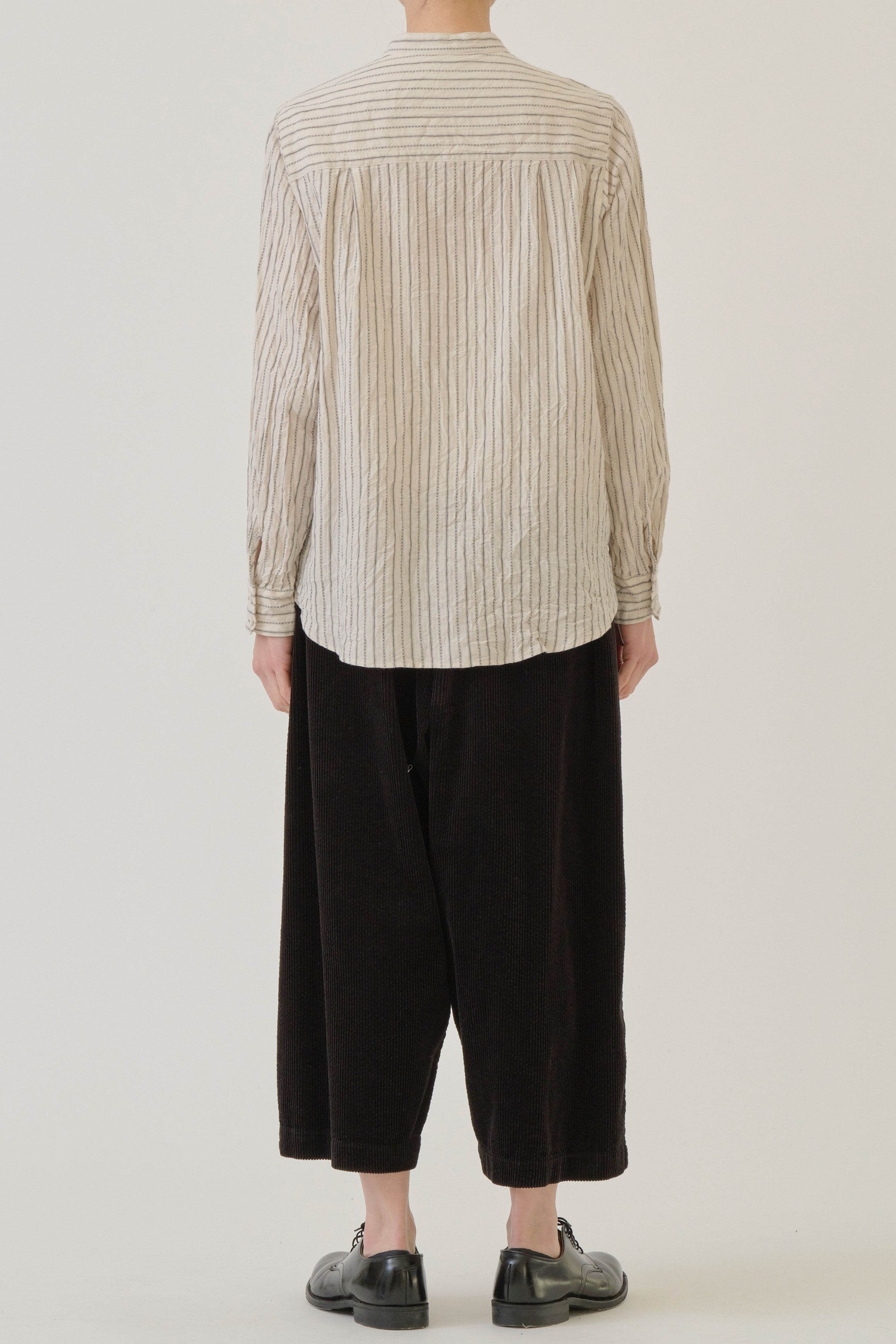 back view of pas de calais dobby stripe shirring brushed blouse ivory long sleeves and relaxed fit with a soft drape
