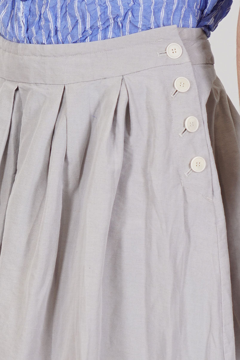detail view of pas de calais skirt cotton linen grey side button opening for an effortless fit