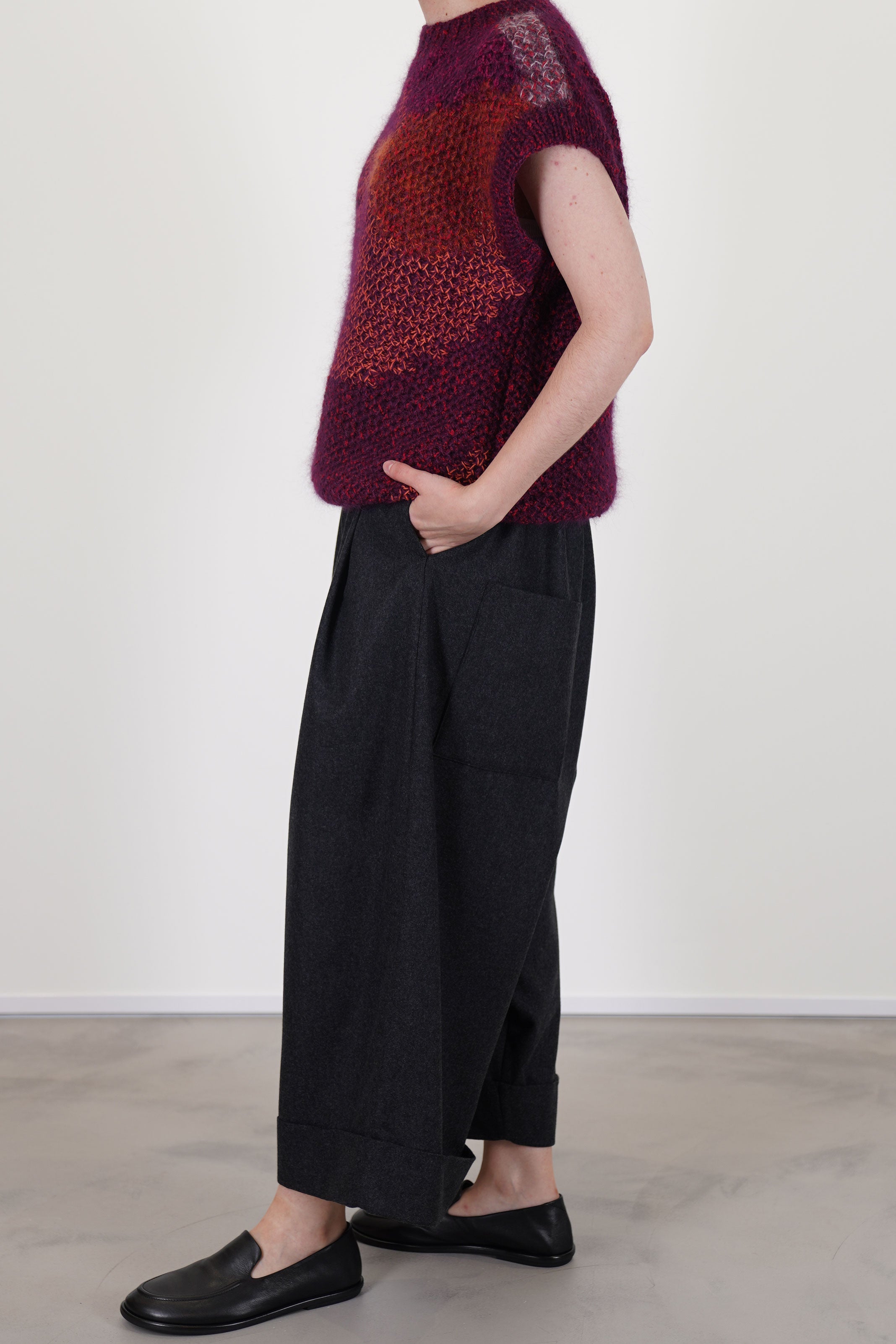 side view of toogood baker trousers wool charcoal crafted from a warm virgin wool-cashmere flannel blend.