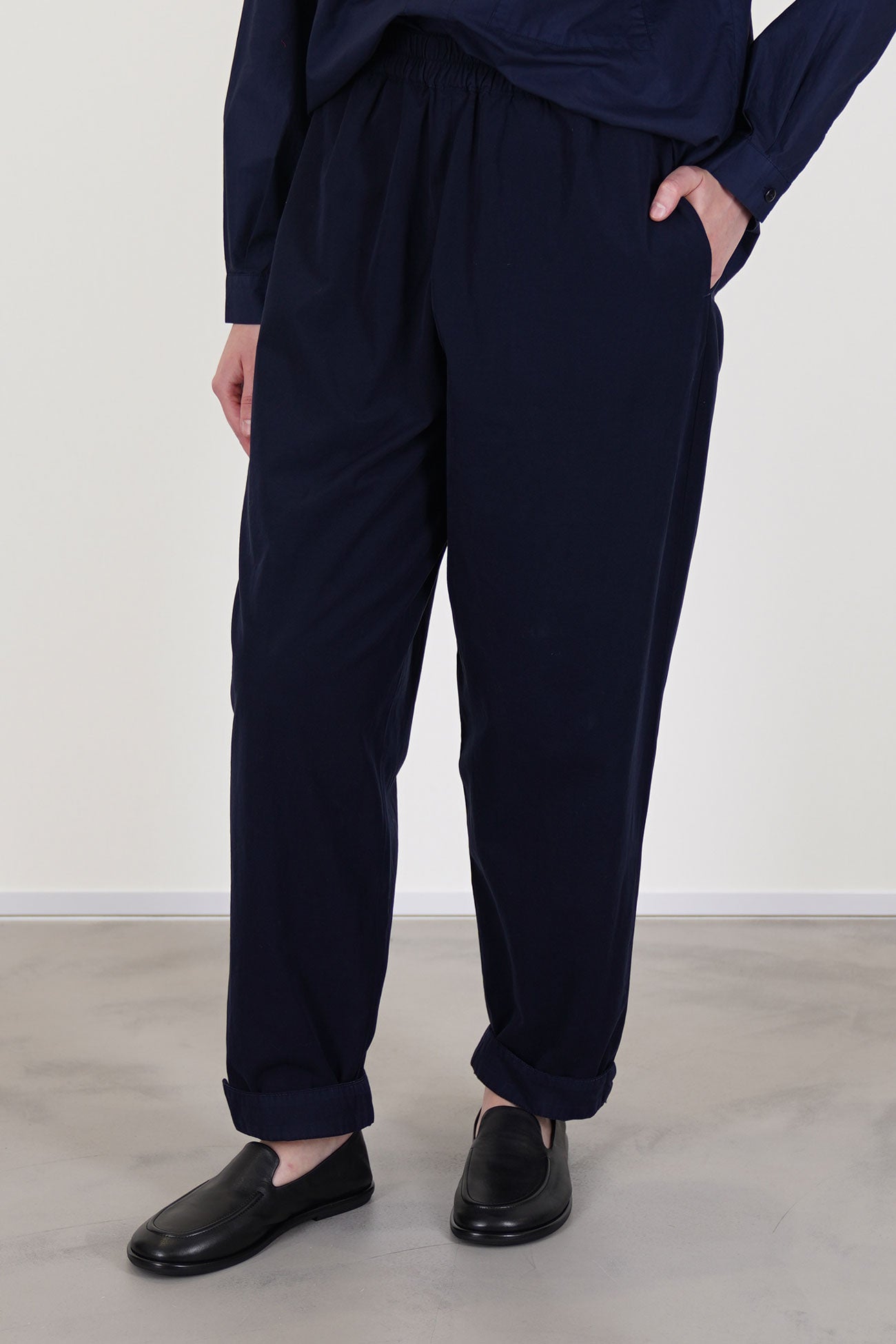 toogood gymast trousers ink feature an elasticated waistband and a tapered leg