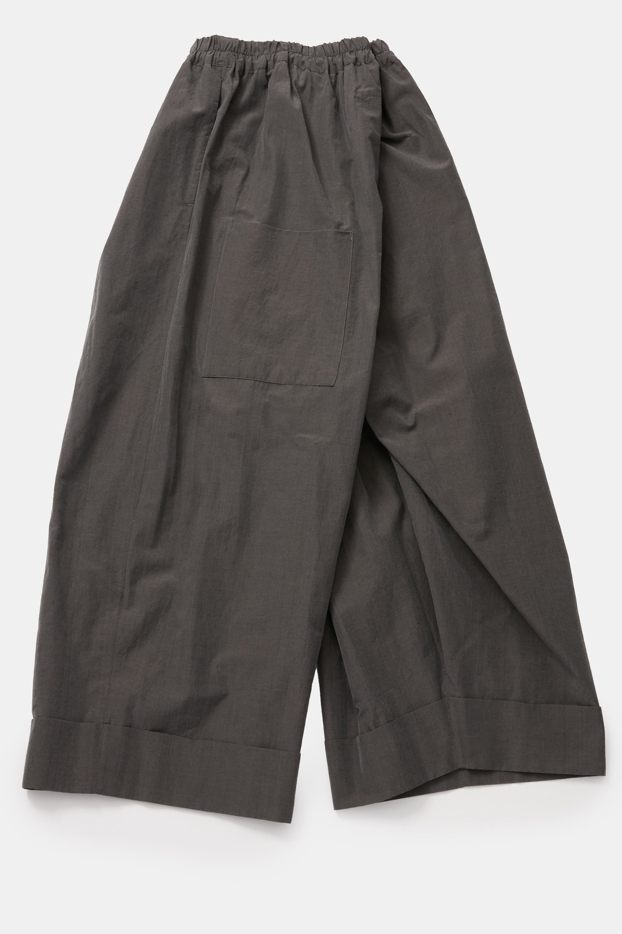 side view of toogood baker trousers cotton silk pencil fixed cuffs and wide leg