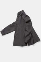 profile product view of toogood draughtsman shirt poplin pencil emphasizing the long tapered sleeves and side slit details