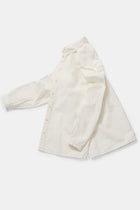 profile view of toogood draughtsman shirt poplin yoghurt  structural design with side slits and tapered sleeves