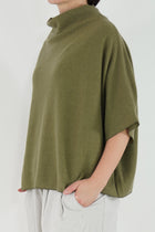 cashmere high neck over olive