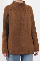 hand knitted dolcevita wool rust