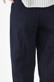 detail view of apuntob (a.b) woolen trousers blue thin stripes thin grey stripe details and back patch pockets