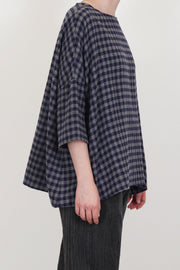 side view of apuntob (a.b) shirt cashmere stone blue check wide and relaxed silhouette with dropped shoulders