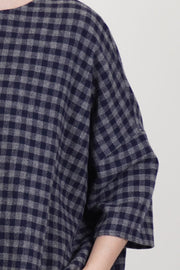 detail view of apuntob (a.b) shirt cashmere stone blue check soft checkered pattern and elbow length sleeves