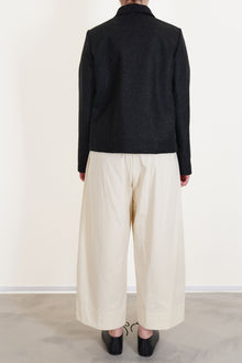 back view of apuntob (a.b) jacket black crafted in virgin wool felted material , striaght hemline, long sleeves