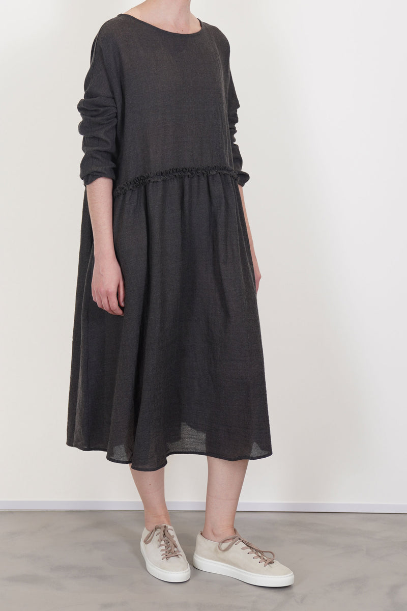 apuntob (a.b) dress wool asphalt grey  boat neckline and long sleeves that create a timeless silhouette