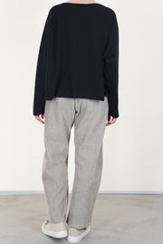 back view of apuntob (a.b) wool silk knitwear black designed with a flattering boat neckline and loose cut