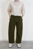 apuntob (a.b) trousers forest crafted worn with shirt natural