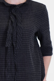 detail view of apuntob (a.b) shirt anthracite black featuring ruffle details at the neckline