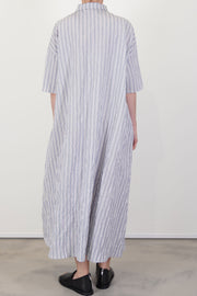 back view of apuntob (a.b) dress abyss elbow length sleeves and midi length