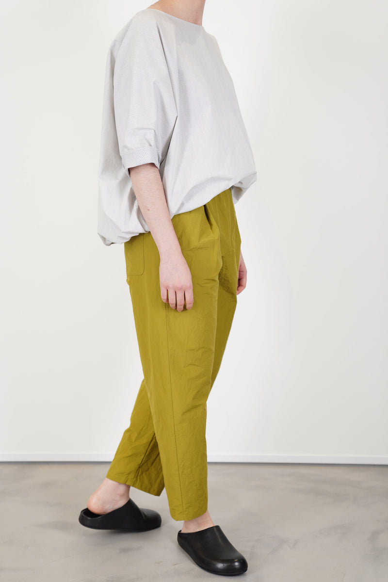 profile view of apuntob (a.b) trousers oil  minimmalist silhouette