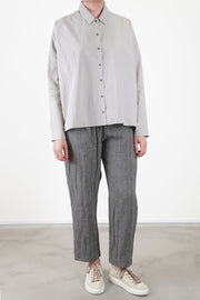 apuntob (a.b) woolen trousers ecru stone worn with apuntob shirt light grey for an effortless and styled look