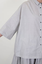 detail view of apuntob (a.b) shirt check meringue understated check patter