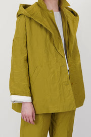 profile view of apuntob (a.b) jacket oil practical slip pockets