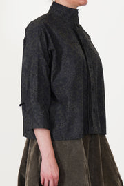 side view of bergfabel claudia shirt dark flowers high collar detail, three-quarter length sleeves