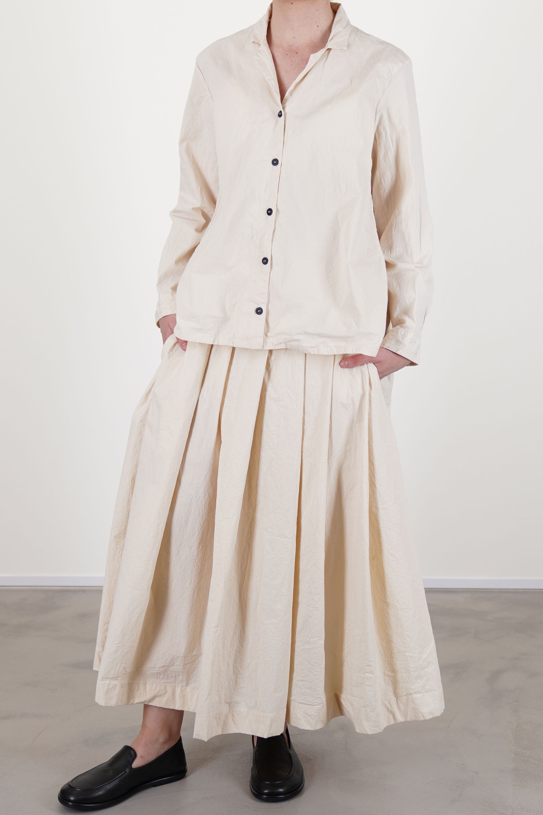 bergfabel jenny shirt off-white worn with matching matilde skirt in off-white