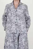 bergfabel jenny shirt bright flowers features features a relaxed, loose silhouette and a v-neckline