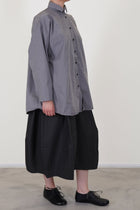 bergfabel long overshirt fog paired with coated cotton carla skirt carbon