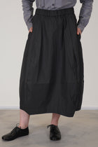 detail view of bergfabel coated cotton carla skirt carbon crafted in a lightweight and unlined coated cotton fabric