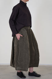 side view of velvet skirt carla mud pocket details