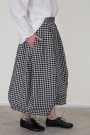 detail view of bergfabel virgin wool carla skirt check midi length in a balloon  style