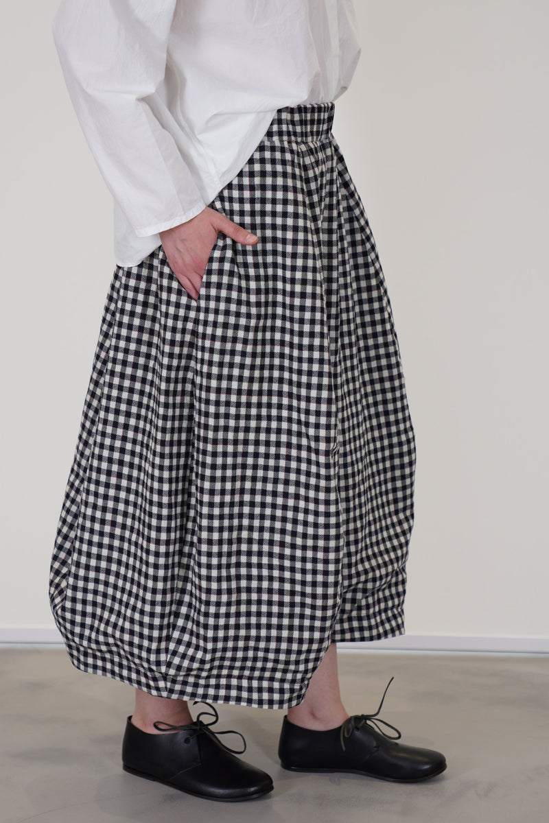 detail view of bergfabel virgin wool carla skirt check midi length in a balloon  style