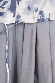 detail view of bergfabel alma shirt blooms strings at the hemline for a more personalised fit