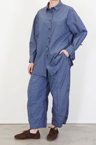 model wearing bergfabel june shirt blue with matching trousers