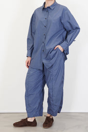 model wearing bergfabel june shirt blue with matching trousers