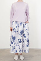 model wearing bergabel rina pullover peony with skirt for an elegant and minimalist look