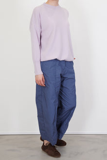 model wears bergabel rina pullover peony with trousers, structural and elegant design